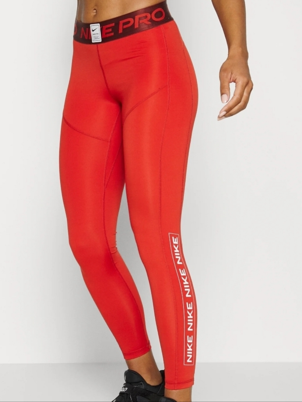 Nike Orange Pro Performance Leggings with Logo Tape
